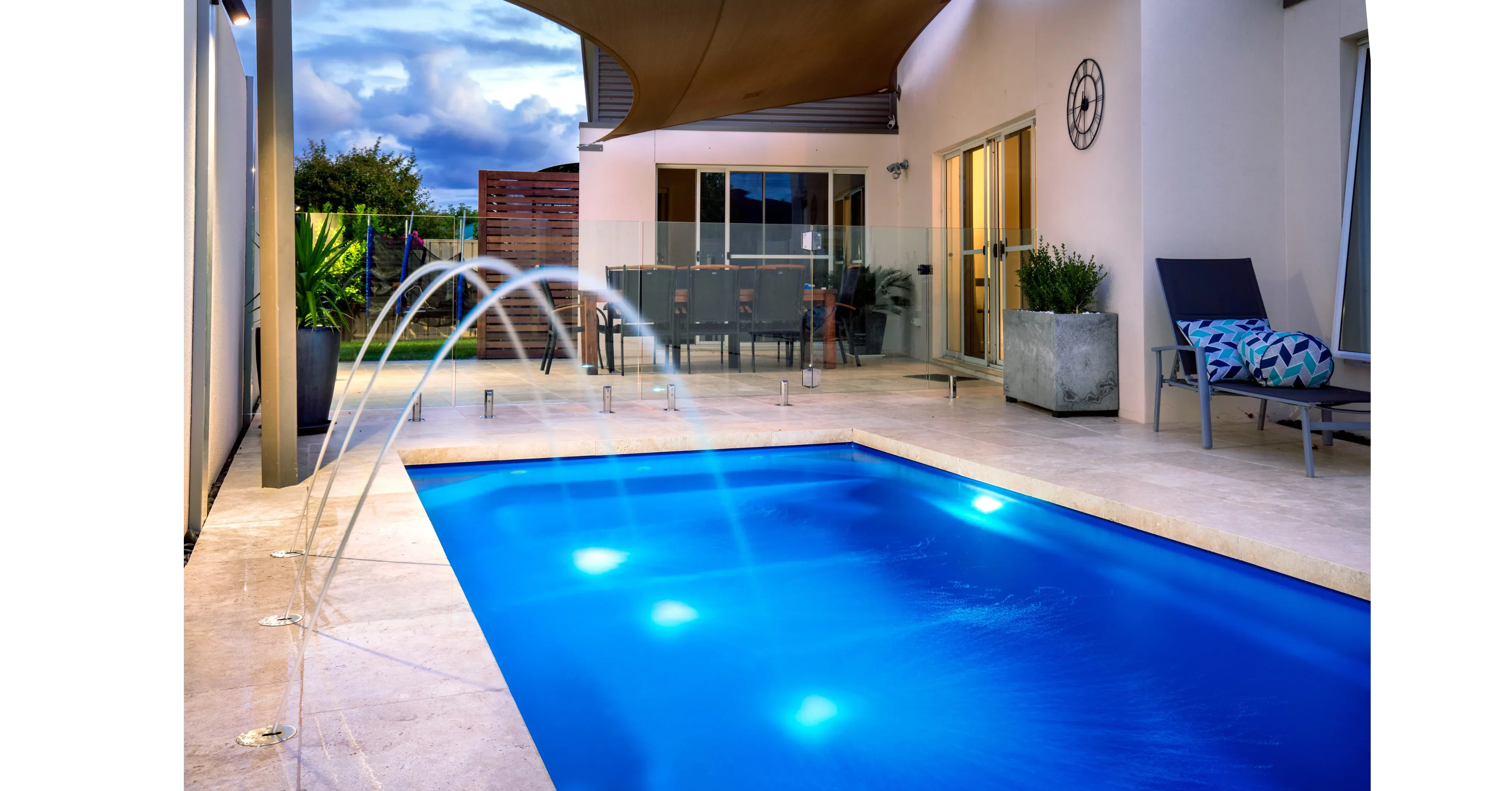 Modern vinyl liner pool with water features in Australia