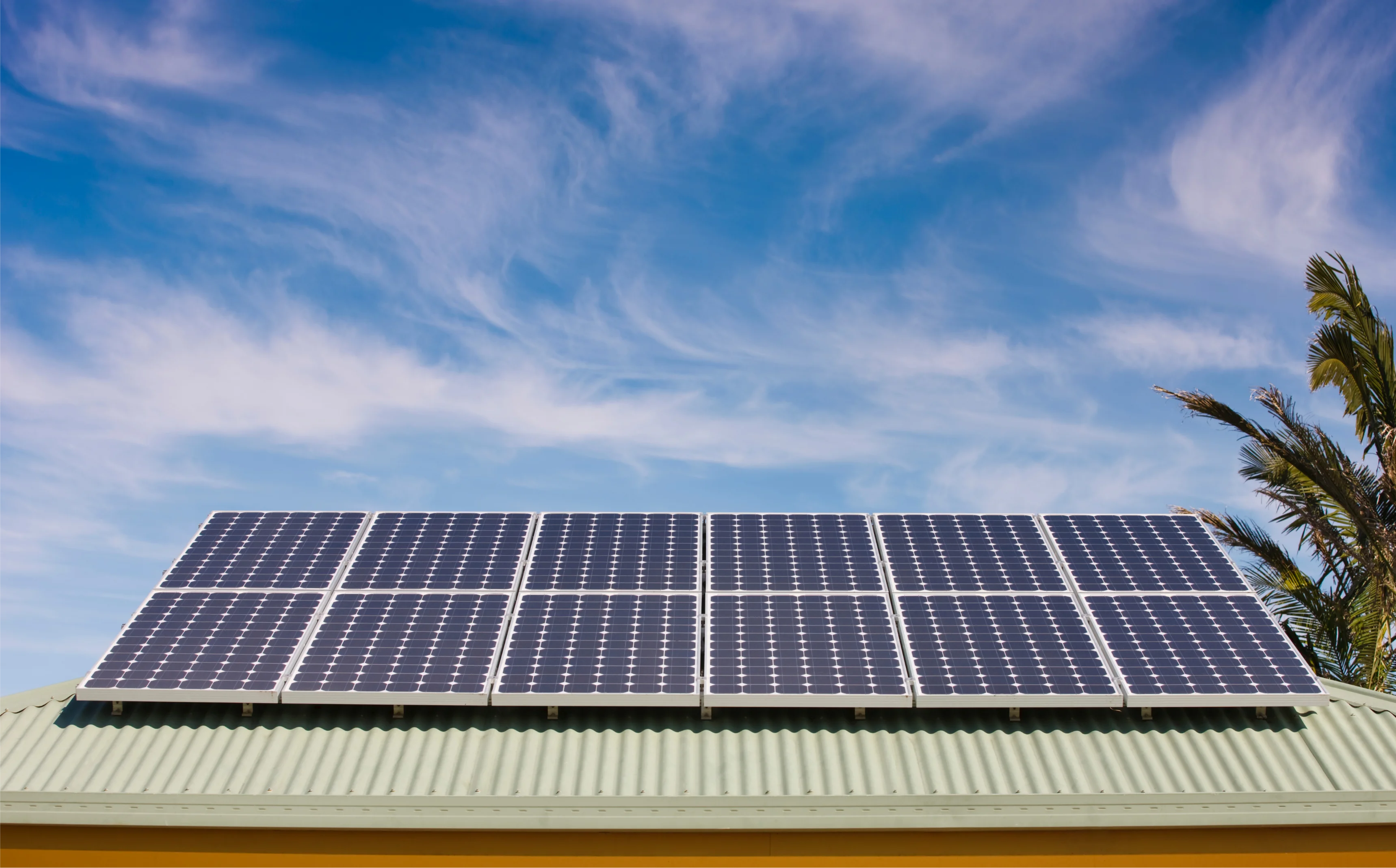 Solar panels installed on Australian residential roof generating clean renewable energy