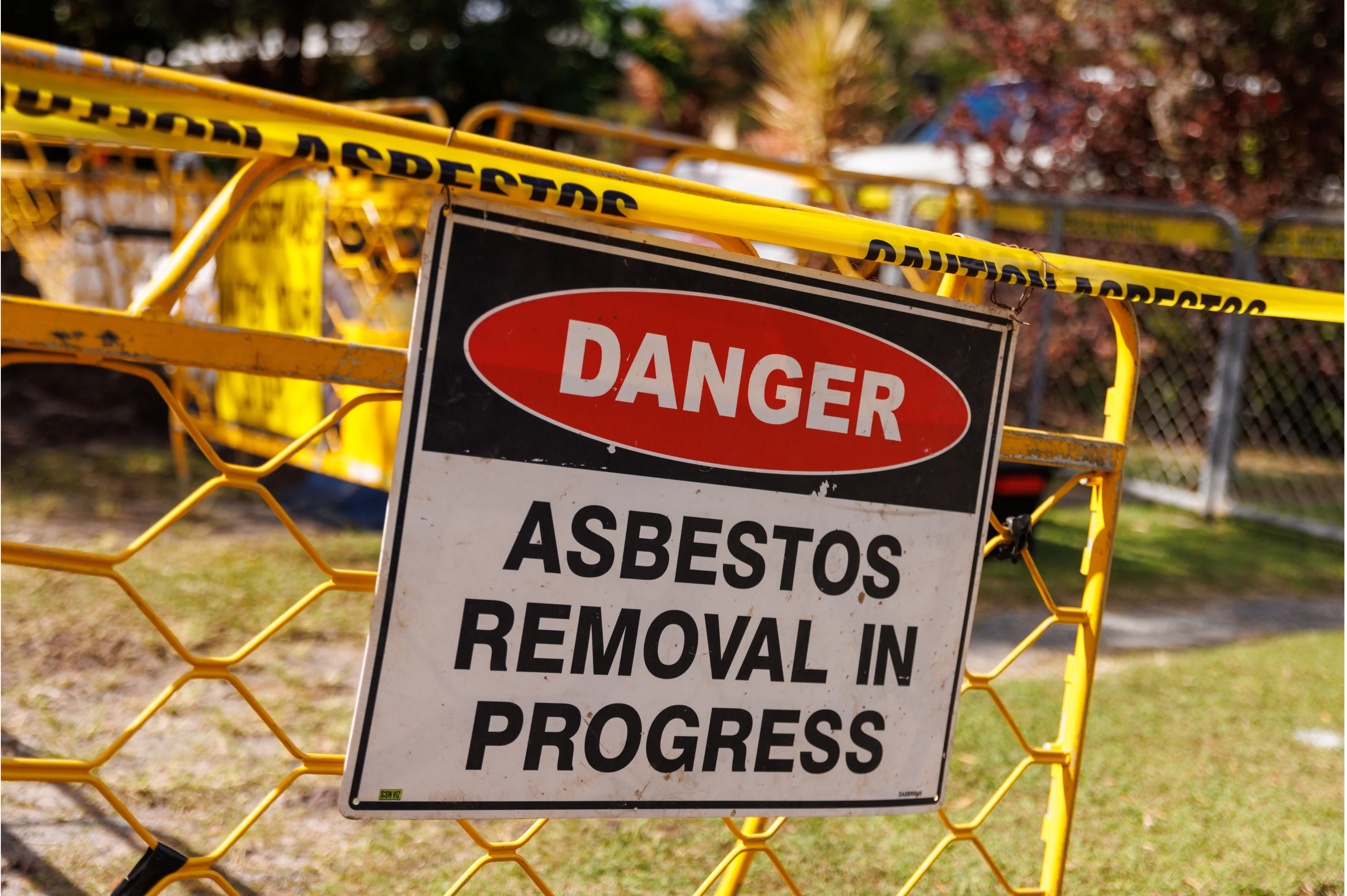Asbestos warning signage at a licensed removal site in Lyons